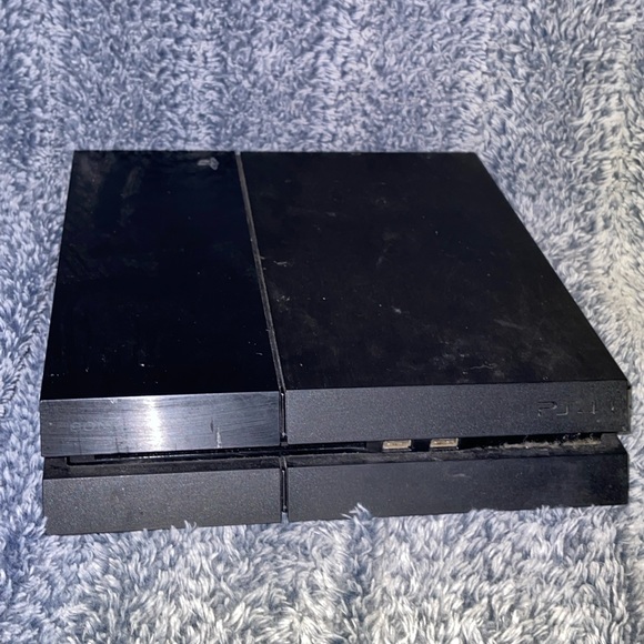 PlayStation 4 in good condition.